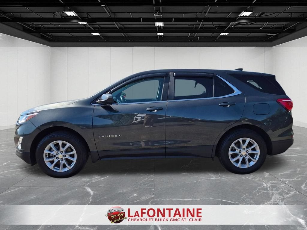 Used 2021 Chevrolet Equinox LT with VIN 3GNAXUEV9ML301135 for sale in China Township, MI