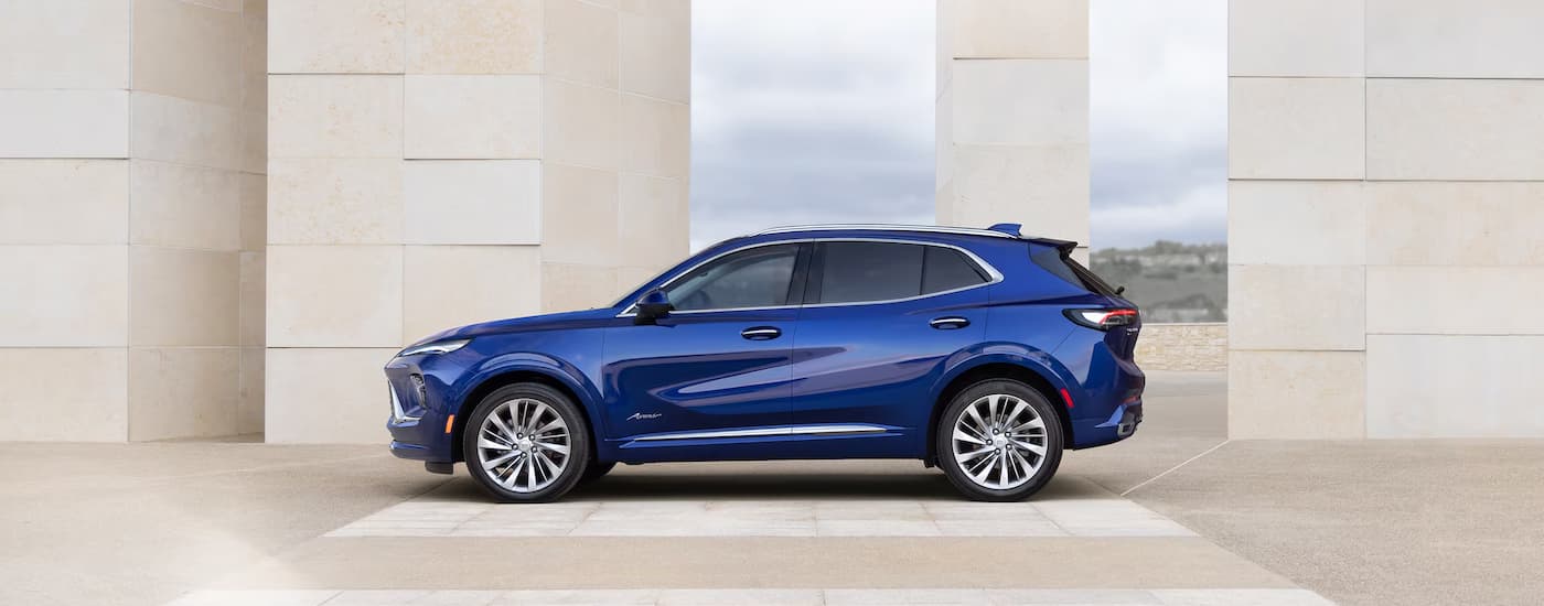 Blue 2025 Buick Envision parked at a Buick dealer near Mount Clemens