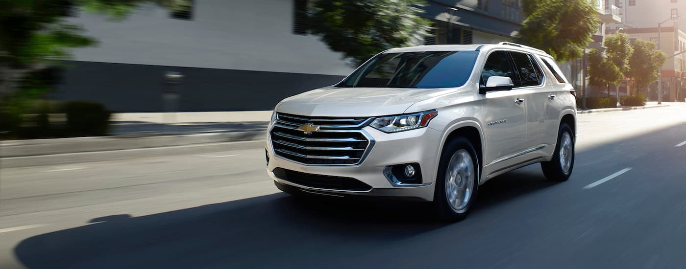 White used 2019 Chevy Traverse for sale driving on a street